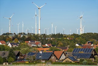 Wind farm above the village of Lichtenau, self-proclaimed energy town, houses with photovoltaic