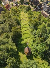 Aerial view of a cemetery in a wooded area next to a village, Gundringen, Nagold, Black Forest,