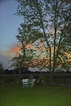 Europe, Germany, Lower Saxony, Stade district, sunset, garden, garden table, Europe