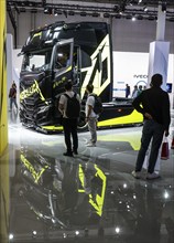 Visitors to the IAA Transportation trade fair look at an IVECO truck, Hanover, 18.09.2024.,