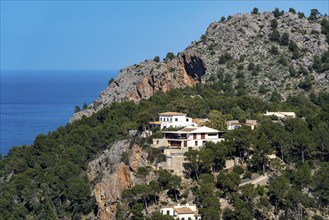 Villas on the cliffs in the north-west of the island, near Alconàsser, Serra de Tramuntana,