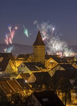 Fireworks on New Year's Eve, view of Korb-Steinreinach in the Rems valley, church tower, Rems-Murr