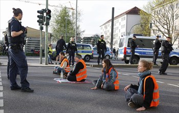 Activists of the Last Generation have taped their hands on a street, Berlin, 24 04 2023