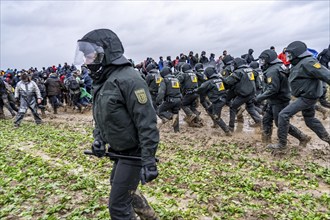 Violent clashes between thousands of demonstrators and the police, after a demonstration against