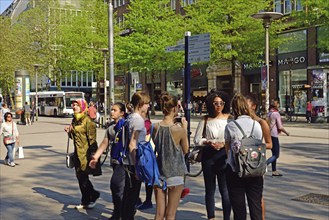 Germany, Hamburg, City, Mönckebergstraße, five young woman in conversation, Hamburg, Hamburg,