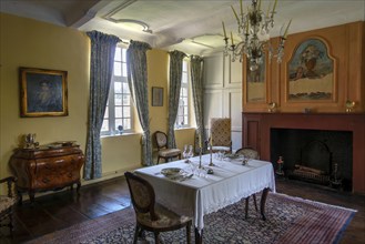 Kasteel van Laarne, interior showing antique dining room inside 14th century medieval moated castle