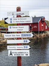 Signpost to sites of touristic interests, fishing village Å i Lofoten, island Moskenesøya, Lofoten,