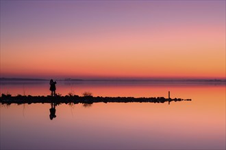 Person in front of sunset at Lake Dümmer, lake, silence, vastness, night, mysterious, Lembruch,