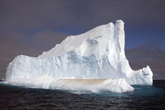 Drifting iceberg in the evening, Antarctica, Icebergs, Antarctica