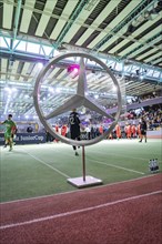 A large brand logo dominates the centre of the sporting event, Mercedes Benz Junior Cup, Glaspalast