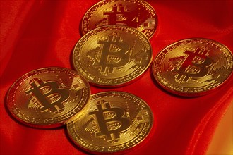 Close-up of symbolic bitcoins