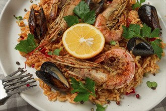 Seafood paella, shrimp and mussels risotto, rice, homemade, top view, no people