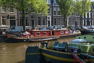 Houseboats on a canal in Amsterdam, Netherlands