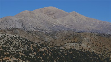 Barren mountain peaks under a deep blue sky in daylight, Lefka Ori, White Mountains, near Askifou,