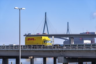 The Köhlbrand Bridge in the port of Hamburg, in front traffic on the A7 motorway, spans the 325 m