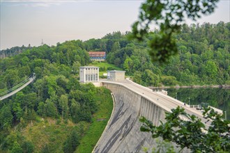 Large dam in a hilly landscape with many trees and lush greenery, Rappbode Dam, Harz Mountains,