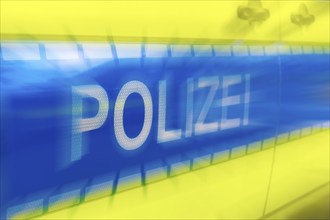 Police car, police lettering on an emergency vehicle, logo, blur, Baden-Württemberg, Germany,