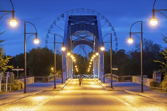 Star bridge, behind it Ferris wheel, blue hour, Magdeburg, Saxony-Anhalt, Germany, Europe