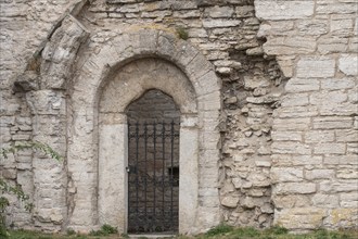 Wrought-iron door, wall, church ruins, Hanseatic city of Visby, UNESCO World Heritage Site, Gotland