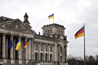 On the anniversary of the Russian war of aggression against Ukraine, Ukrainian flags are hoisted at