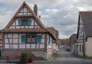 Village street with half-timbered houses, Cleebourg, Département Bas-Rhin, Alsace, France, Europe