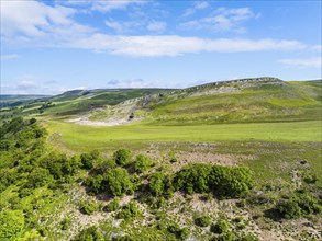 Farms and Mountains over Bainbridge Villagefrom a drone, Leyburn, North Yorkshire, England, United