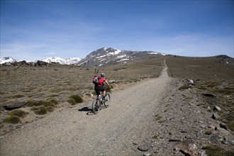 Cycling in the Sierra Nevada Mountains in the High Alpujarras, near Capileira, Granada Province,