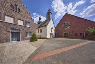 St Mauritius Church and residential building in the Hausdülmen district, Dülmen, Münsterland,