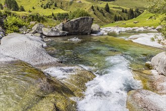 Rein da Christallina torrent near Medel. Pools with crystal-clear water in the riverbed. Canton of