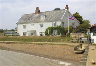 Waterfront house on beach at Orford, Ipswich, Suffolk, England, UK