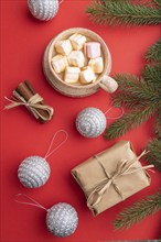 Christmas or New Year composition. Decorations, box, cinnamon, silver balls, fir and spruce