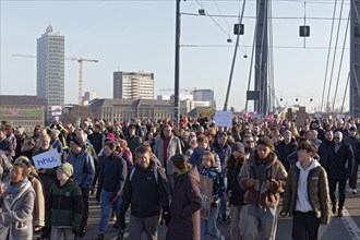 Demonstrators march across the Rheinknie Bridge, large demonstration against right-wing extremism