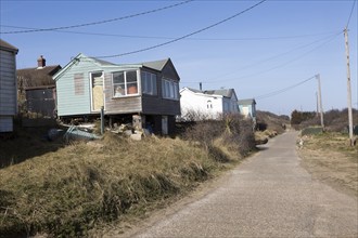 March 2018, Clifftop property just inland from homes collapsing due to coastal erosion after recent