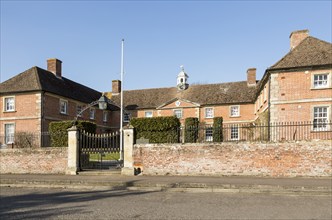 Almshouses of The Hospital of Saint John, Heytesbury, Wiltshire, England, UK present building dates