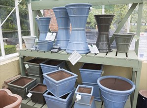 Display of terracotta pots on sale, The Walled garden plant nursery, Benhall, Suffolk, England, UK