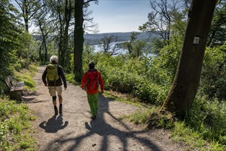 Hiking on the Baldeney Steig, a hiking trail around Lake Baldeney in Essen, a Ruhr reservoir, over