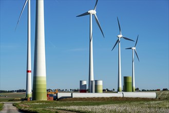 Construction site of a new wind turbine, modules of the tower, wind turbine from the manufacturer