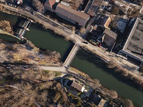 Bird's eye view of a bridge over a river with neighbouring roads and vehicles, Nagold, Black