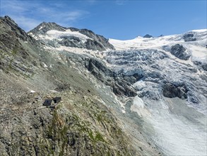 Mountain hut Cabane de Moiry, located close to the retreating Moiry glacier, hiking trail, aerial