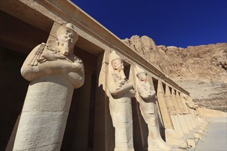 Part of the temple complex, statues of Hatshepsut at the mortuary temple of Hatshepsut, Hatshepsut