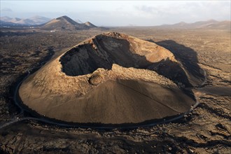 Aerial view of the El Cuervo volcano at sunrise, Lanzarote, Lanzarote, Canary Islands, Spain,