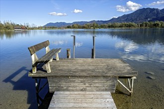 Bathing jetty with wooden bench at Lake Kochel, Schlehdorf, Kochel am See, behind mountain