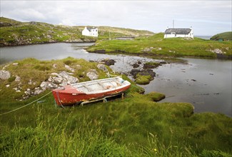 Small fishing boat on the east coast of Barra, Outer Hebrides, Scotland, UK