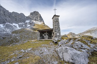 Lamsenjoch Chapel, memorial for mountaineers who died in an accident, in autumn, rocky summit of