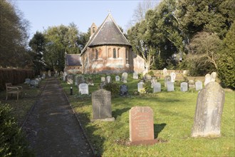 Holy Trinity Village parish church Oare, Wiltshire, England, UK built 1858 red brick Victorian