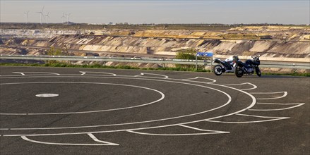 Car park at Skywalk Jackerath with painted bucket wheel, Garzweiler, Jüchen, opencast lignite mine,