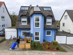 Detached house with various solar modules, in addition to normal standard solar panels, PV tube