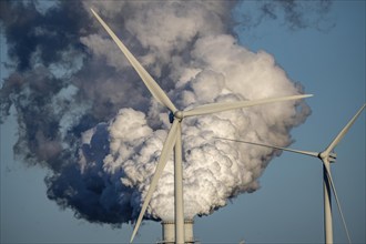 Chimneys, smoke plume of the RWE coal-fired power plant Eemshavencentrale, wind power plant, in the