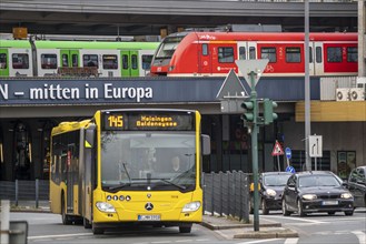 Local transport, junction at the main railway station, local trains, city bus, in the city centre