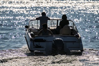 Summer, cruising in a motorboat, in the harbour of Copenhagen, Denmark, Europe